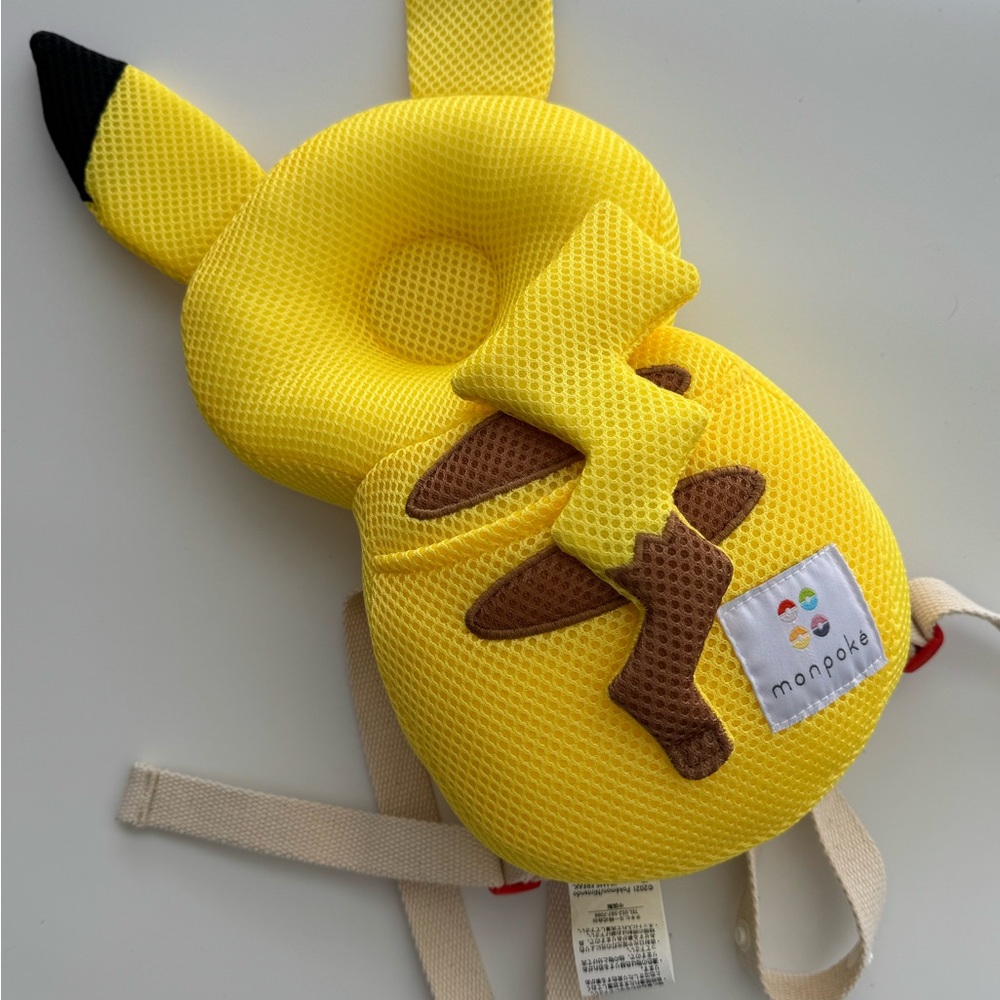 Yellow Stuffed Animal Head Pillow backpack with Pikachu Design